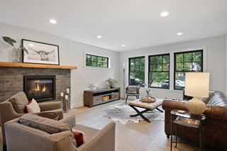 Large living room with Heat & Glo fireplace and spacious seating area.