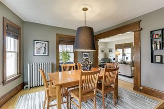dining room with marble built-in bar and Edison Lamp sconces