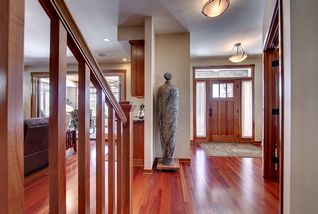 Spacious entry area. Sidelights and a toplight complement the mission style entry door.