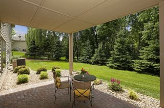 Paver patio with serene views & hot tub rough in.  ( could be easily be screened in)