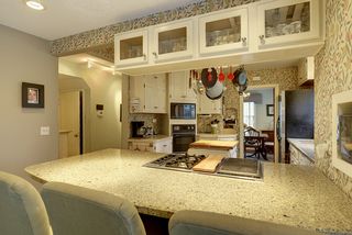The Kitchen features this Informal Dining Island...