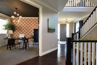 Main floor office /study off the foyer - upper level loft open to foyer...