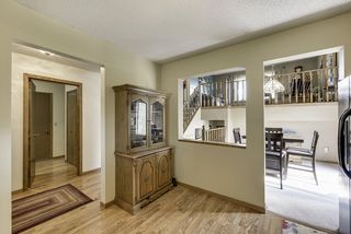 view from the kitchen to the laundry, dining, living areas