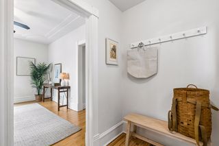 Sweet foyer is lit with eastern facing stained glass window