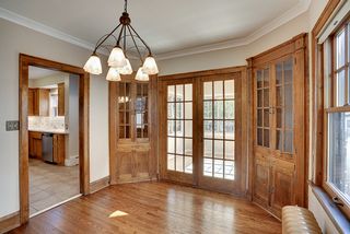 Dining anyone? Built in corner cabinets with glass shelving provide display space for your finest treasures!
