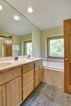The master bathroom has double sinks, separate shower and a Jacuzzi tub