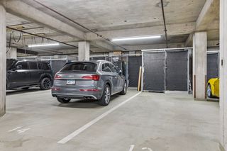 Two Spacious 8' x 30' tandem garage stalls provide enough space for up to four vehicles.  Current modular storage cages can be removed.  Additional 2nd floor storage room.