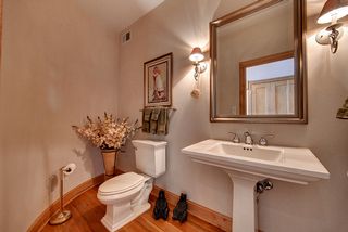 The soft, curved walls give this main floor 1/2 bath an elegant feel.