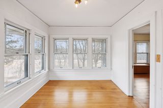 upper sunroom with W River Parkway view