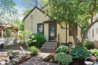 Water feature completes the backyard. Back door leads to mud entry and kitchen