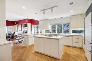 Large kitchen with center island and peninsula.