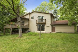 Deck off of the living room and private balcony off of the master bedroom. Patio access from the family room.