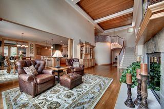 Great room space looking toward entry area, Built in wet bar with refrigerator and sink.