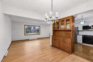 Living and dining areas flow conveniently into the refreshed kitchen