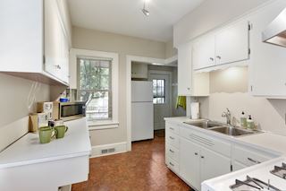 Freshly painted kitchen completes the main floor public rooms