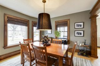 dining room with marble built-in bar and Edison Lamp sconces