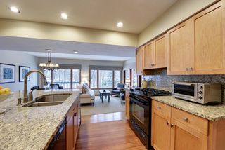 Gas range has pullout hood/fan overhead hidden in cabinetry!
