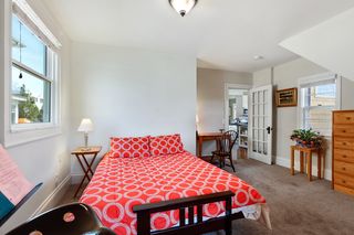 Main Floor Bedroom with door to back deck