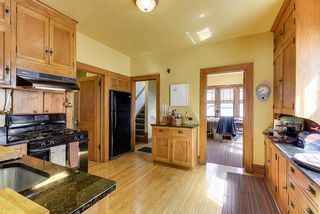 Sun room off of kitchen offers great and sunny den, office or project room. Back door leads to step to basement and backyard