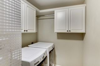 Convenient Upper Level Laundry Plus Enameled Cabinets