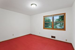 The spacious Owner's Suite offers backyard views, 
a double window, and double closet.