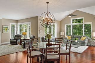 Informal dining area opens to the sunroom and family room