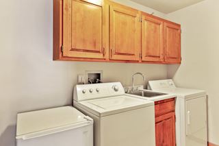 Laundry room with more storage in unit