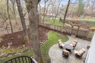 The design of the fence was in keeping with the cottage feel of the exterior.  Plenty of flat play space.  The lot extends well past the fence line