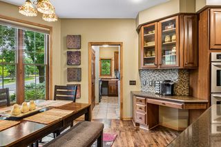 Mosaic Tile Backsplash and Large informal Dining Area