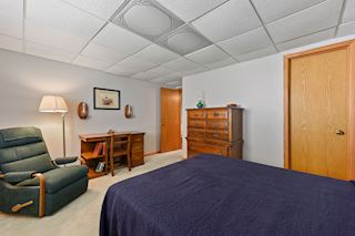 A walk-in closet is behind the door to the right.