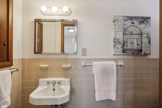 Half bathroom off the primary bedroom.