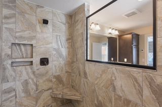 Tiled, walk-in shower in master bath