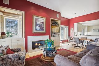 Close up of fireplace and both built-in cabinets.