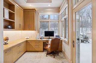 Working office with patio access.  Located near kitchen.  Drawers
are very heavy duty!