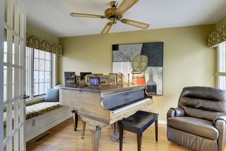 The Main Floor Sunroom also features Hardwood Floors & Window Seat! 