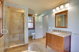 The 2nd Floor Spa Bathroom features Heated Floors, Walk-In Shower and Custom Vanity.