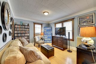 Bedroom #2 features Hardwood Floors and is currently used at a Den/TV Room! 