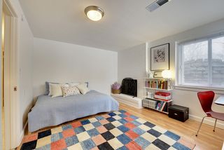 The Walk-Out Level Bedroom features a Wood Burning Fireplace! 