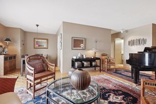 Dinig Room entrance to Kitchen and Hallway leading to  Baths and Bedrooms