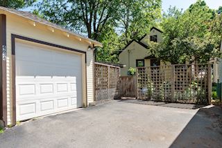 Nicely fenced backyard and one car garage