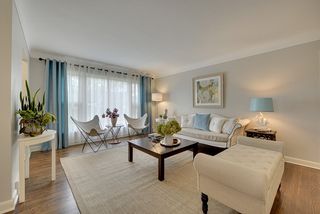 Pleasing soft gray color pallet - large front window. 