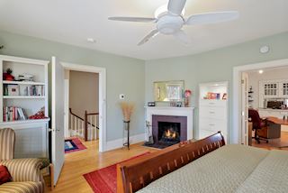 Master Bedroom with wood burning fireplace and adjoining room currently used as an office