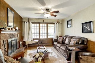 Just Beyond The Kitchen Is This Cozy Hearth Room. 