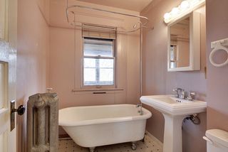 The 2nd Floor Full Bathroom features an Original Clawfoot Bathtub (with Shower) and New Pedestal Sink...