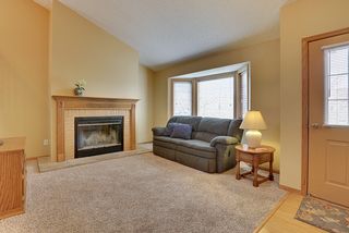1500 4th St NE - Spacious living room with cozy fireplace