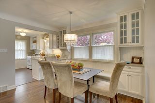 Additional cabinetry flanks built-in window bench. 