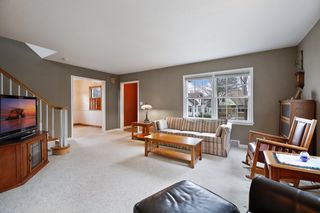 Living room, eat in area of kitchen to the left, front entry in center