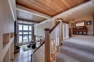 Views from the upper stair landing of great room and Bald Eagle Lake.