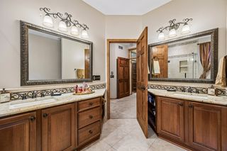 Ceramic Tile Flooring and Dual Granite Vanities
