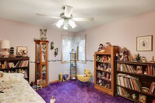One of four upper level bedrooms - two more bedrooms on lower level...